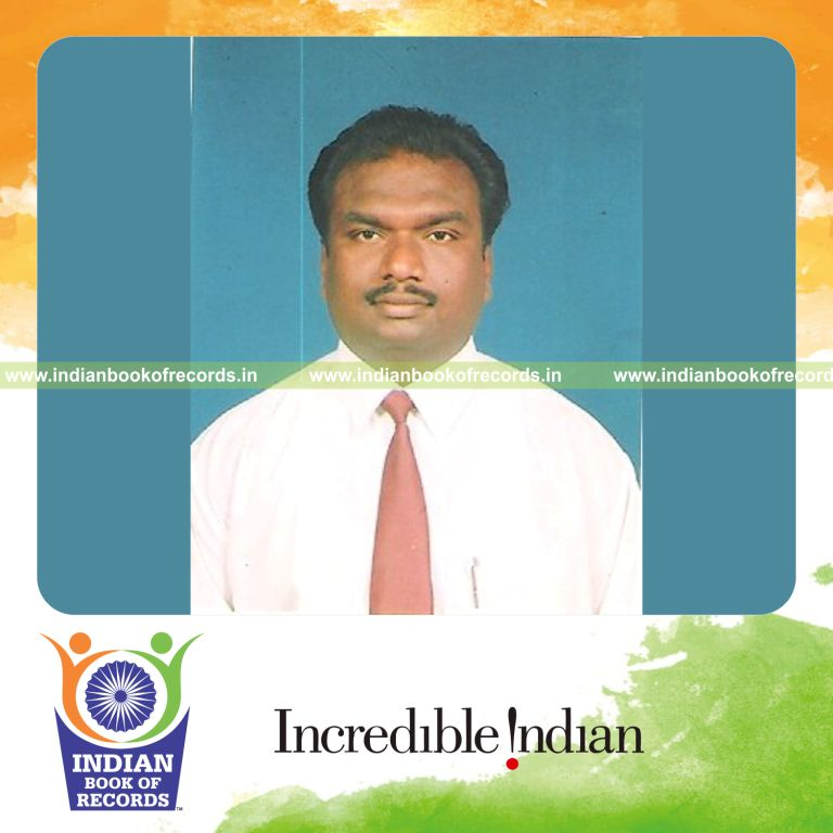 male individual writing sree rama on rice seeds repeatedly for record in Indian Book of Records