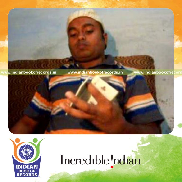 individual performing maximum triangle card cuts in 30 seconds for record in Indian Book of Records