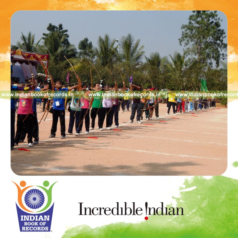 tribal archers participating in large scale archery contest for Indian Book of Records