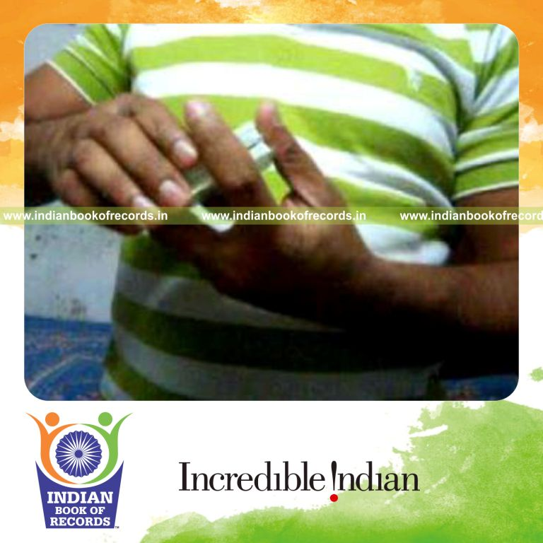 individual performing maximum triple pivot card cuts in 30 seconds for record in Indian Book of Records
