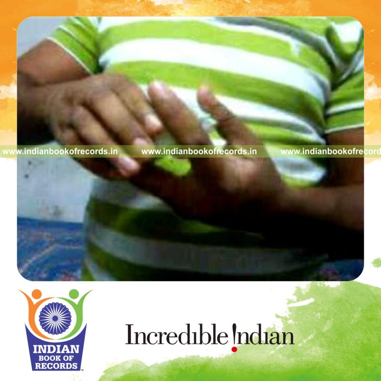 individual performing maximum triple pivot card cuts in one minute for record in Indian Book of Records