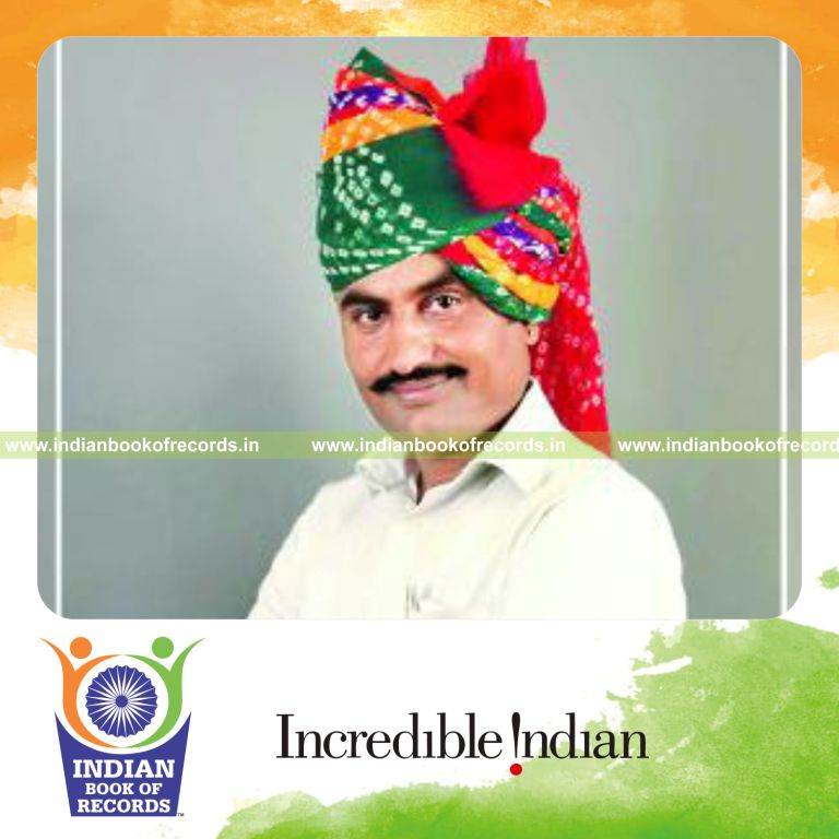 male tying multiple turbans quickly for Indian Book of Records