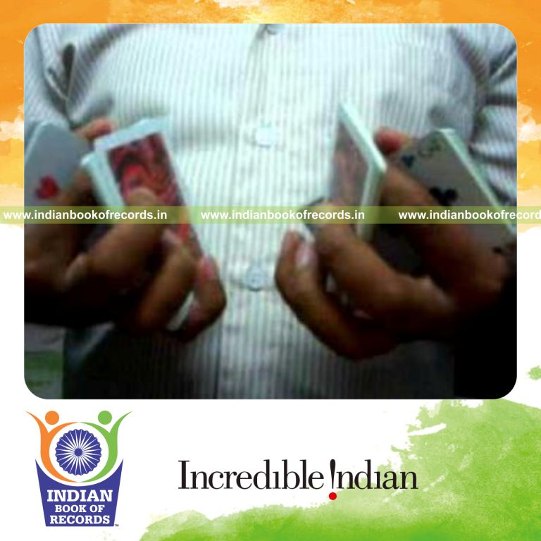 individual performing maximum two handed three packet thumb cuts in 30 seconds for record in Indian Book of Records