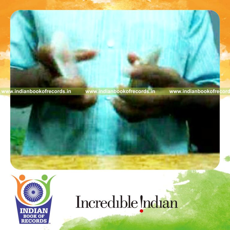 individual performing maximum two handed thumb cuts in 30 seconds for record in Indian Book of Records