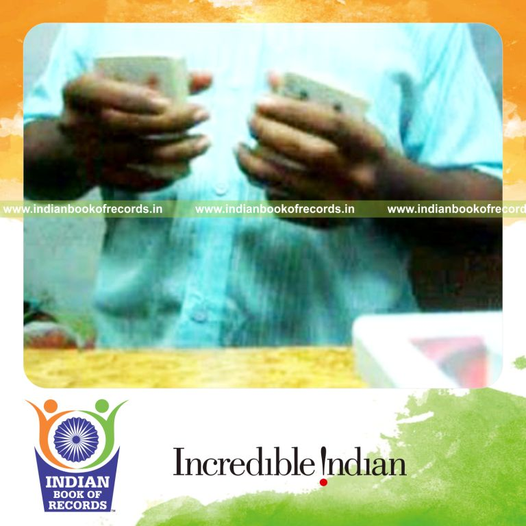 individual performing maximum two handed thumb cuts in one minute for record in Indian Book of Records