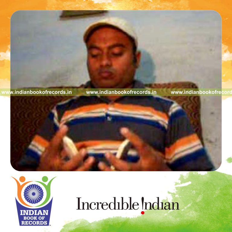 individual performing maximum two handed triangle card cuts in 30 seconds for record in Indian Book of Records