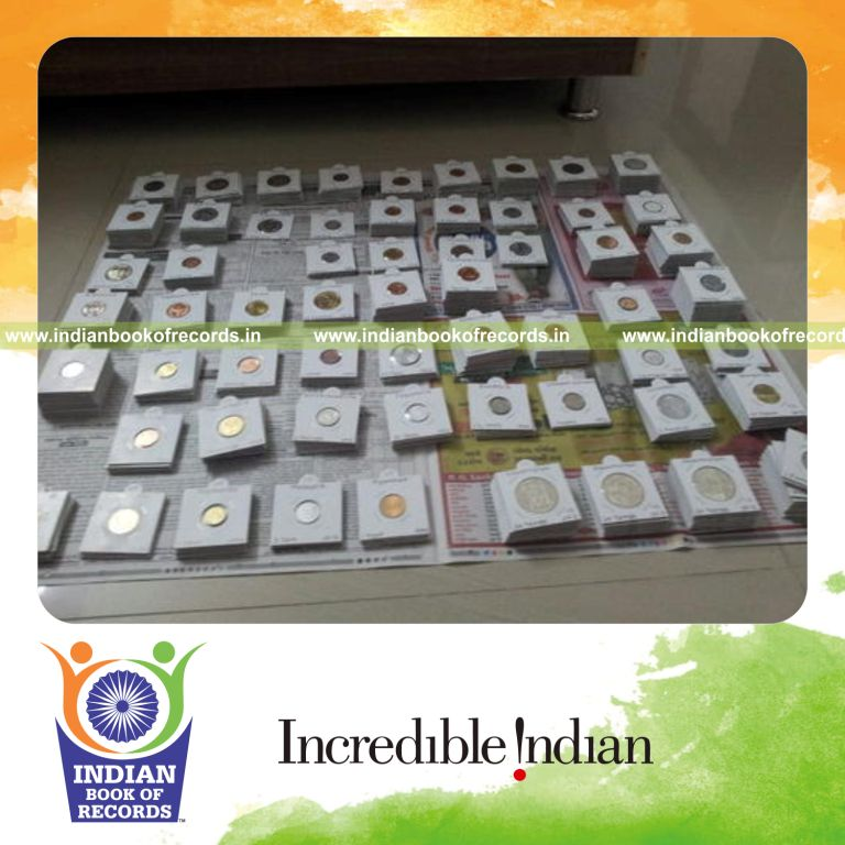 collection of unique currency coins and bank notes displayed for Indian Book of Records