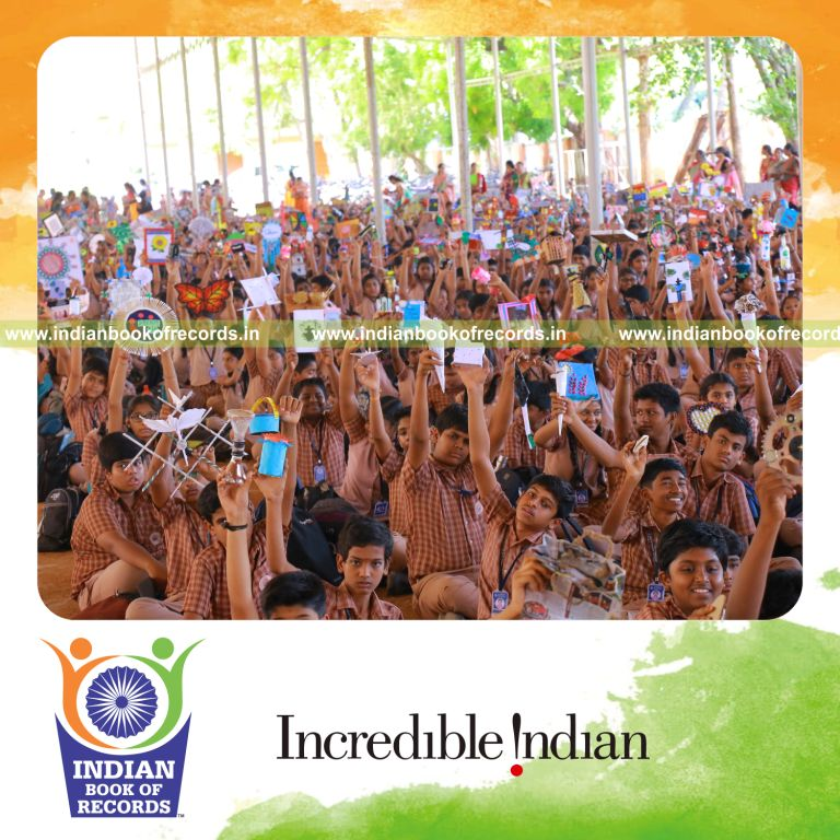 A large group creating useful items from waste materials simultaneously at one location for Indian Book of Records