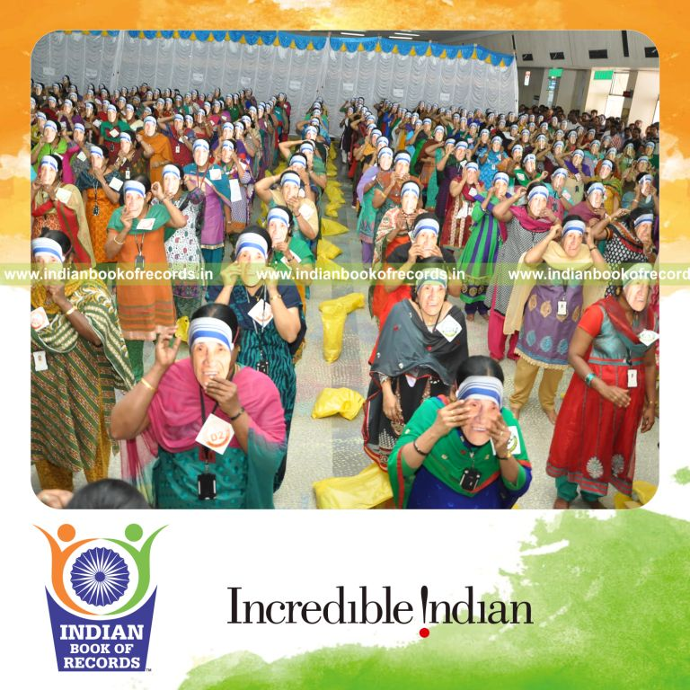 women wearing mother teresa masks simultaneously for Indian Book of Records