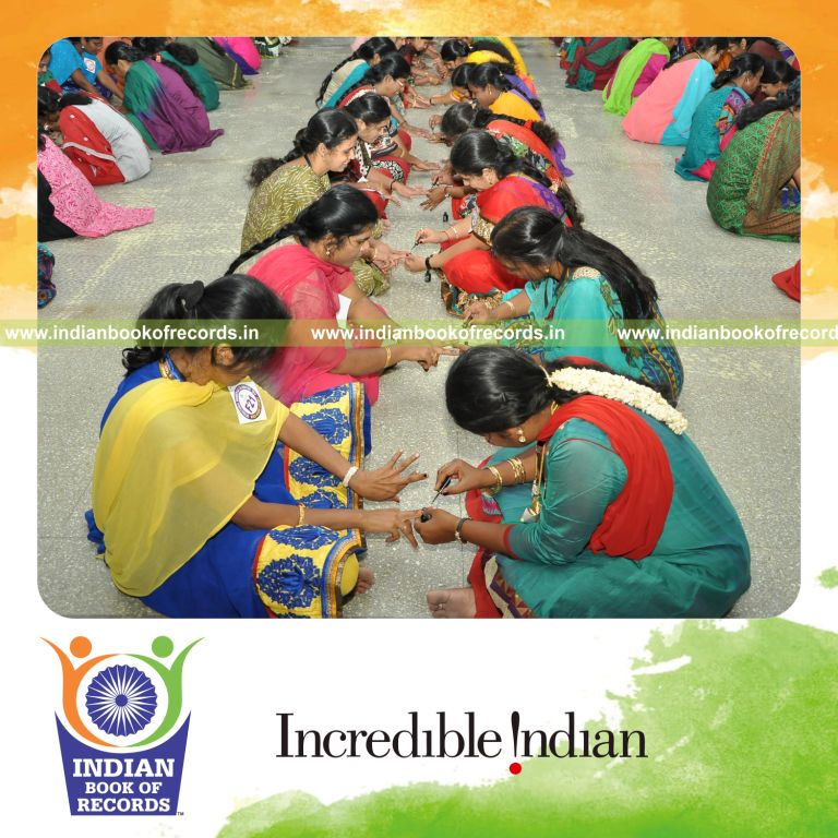 women painting nail polish simultaneously for Indian Book of Records