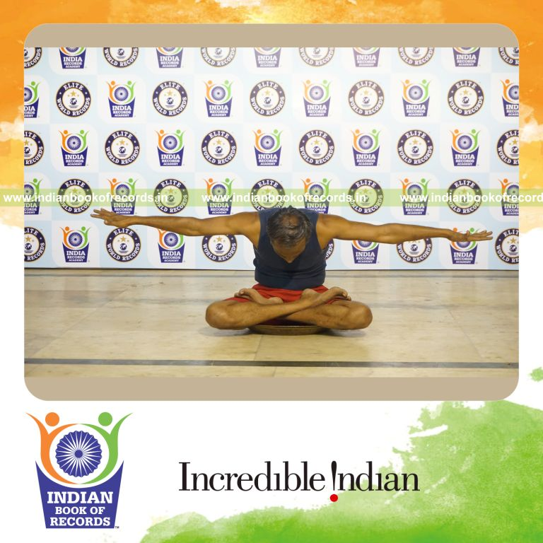 individual performing maximum yogasanas on a brass plate in 15 minutes for record in Indian Book of Records