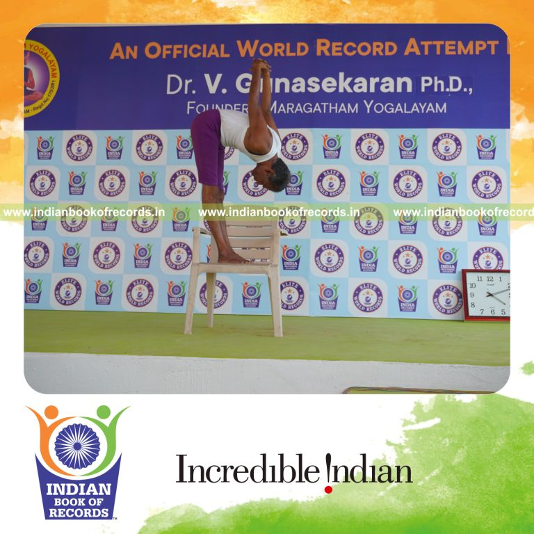 individual performing maximum yogasanas on a chair in 5 minutes for record in Indian Book of Records