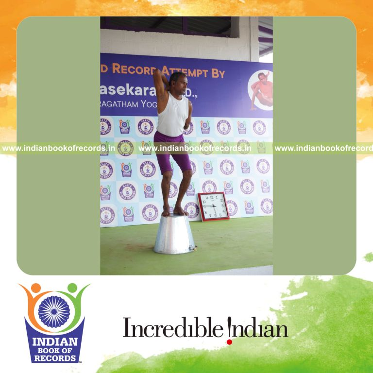 individual performing maximum yogasanas on an inverted bucket in 5 minutes for record in Indian Book of Records