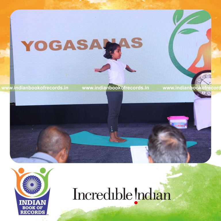individual minor female performing maximum yogasanas in 5 minutes for record in Indian Book of Records