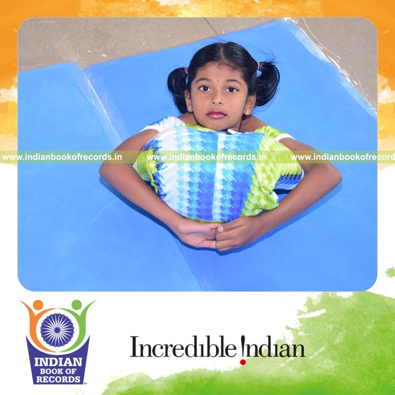 A young child performing multiple yogasanas within a short time featured in Indian Book of Records