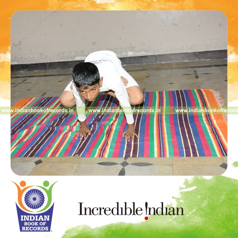 young male performing yogasanas within one hour for record in Indian Book of Records
