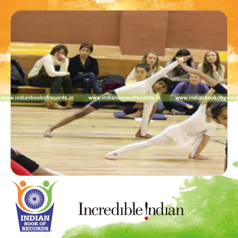 male individual performing multiple yogasanas within twelve minutes for record in Indian Book of Records