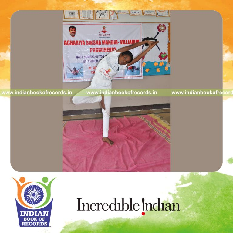 young female performing yogasanas within three hours for record in Indian Book of Records