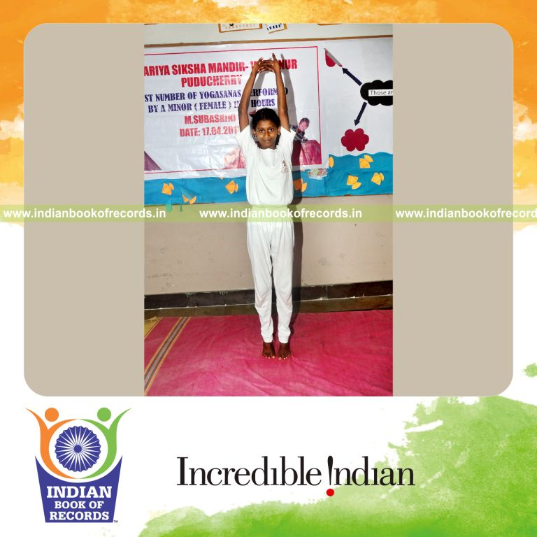 young female performing yogasanas within six hours for record in Indian Book of Records