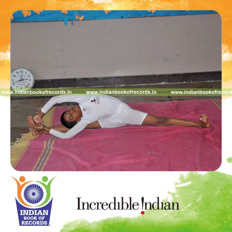 young male performing yogasanas within six hours for record in Indian Book of Records