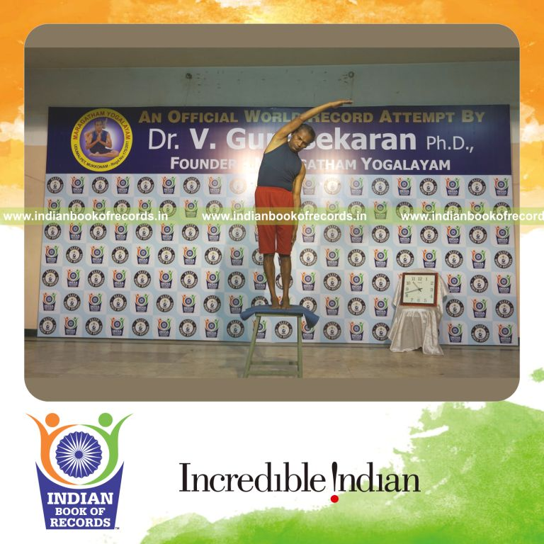 individual performing maximum yogasanas on a stool in 15 minutes for record in Indian Book of Records