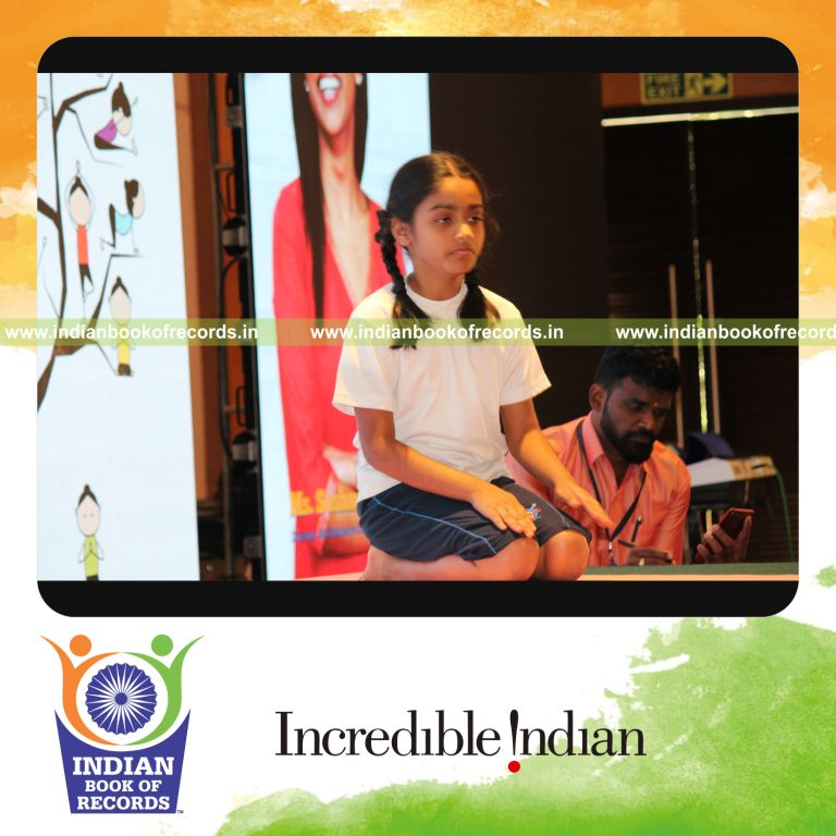 individual minor female performing maximum yogasanas on a table in 5 minutes for record in Indian Book of Records