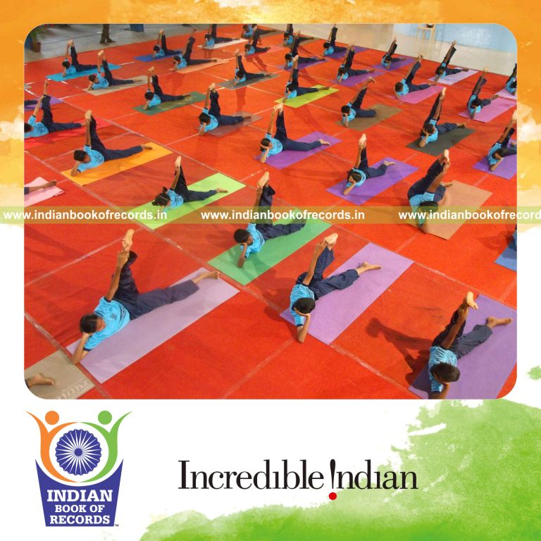 group performing yogasanas simultaneously within three hours for Indian Book of Records