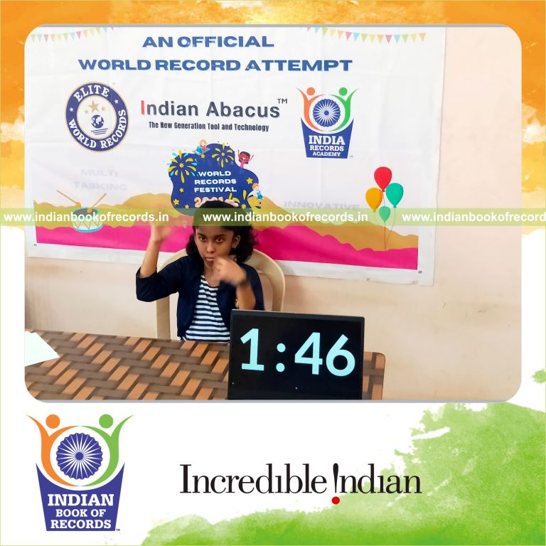 A participant quickly solving single-digit addition problems across three rows in three minutes for the Indian Book of Records