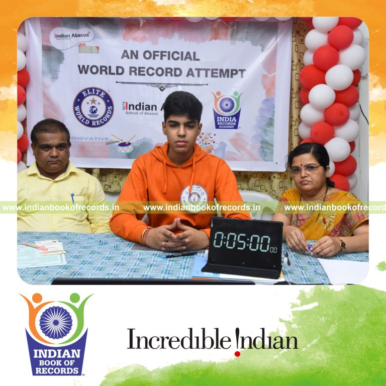 A young participant solving numerous division problems within five minutes for the Indian Book of Records