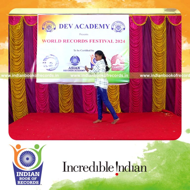 Young participant solving arithmetic problems while performing Silambam simultaneously for Indian Book of Records