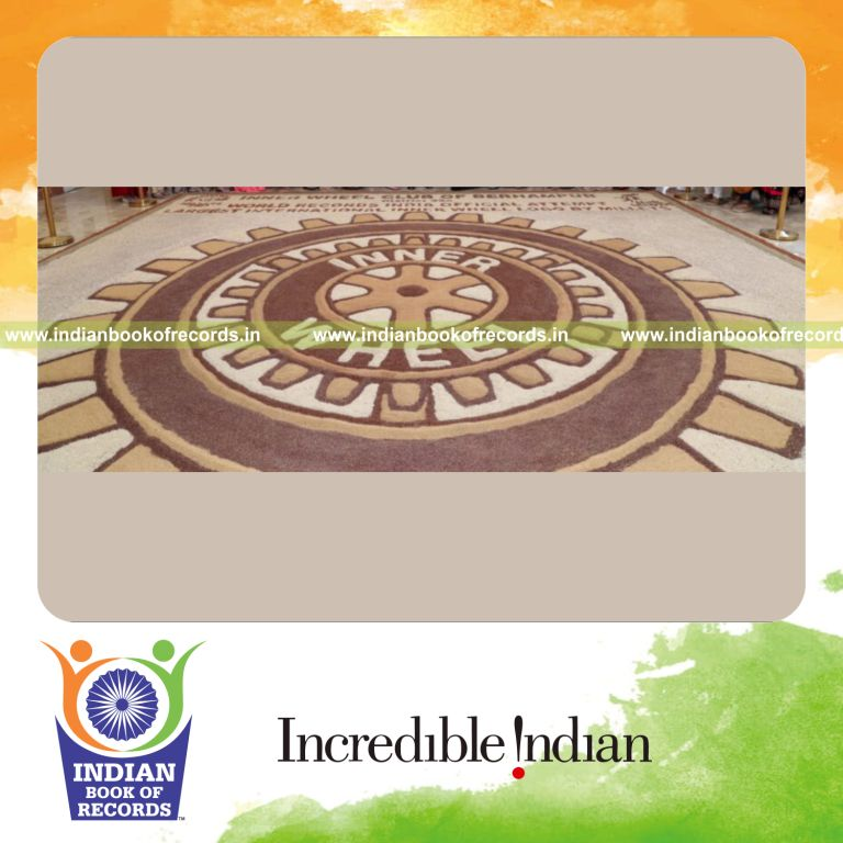 Large logo created using millet grains and seeds arranged creatively recognized by Indian Book of Records