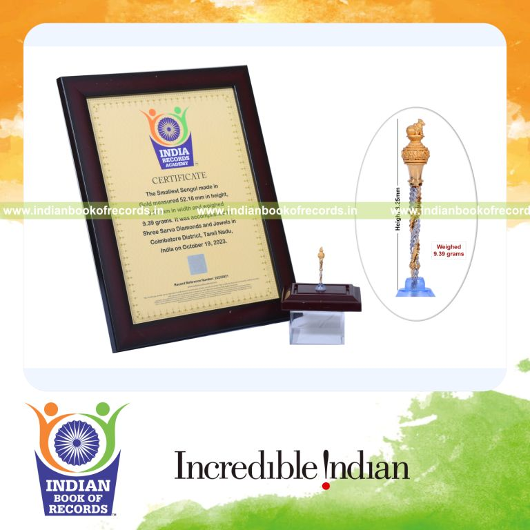 Detailed miniature gold Sengol created with intricate design recognized by the Indian Book of Records