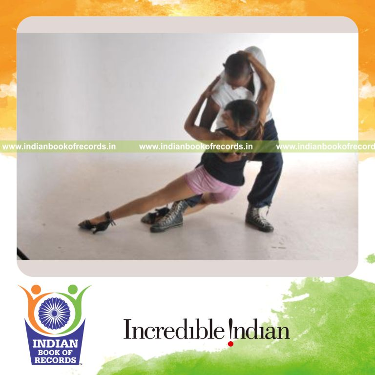 dancers performing multiple swing dance flips for record achievement in Indian Book of Records
