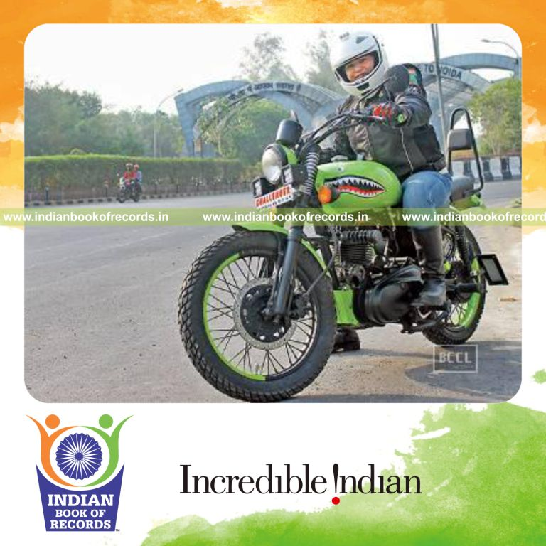 female rider reaching maximum altitude on motorcycle for Indian Book of Records
