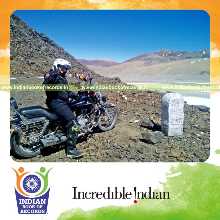 female crossing multiple mountains for Indian Book of Records