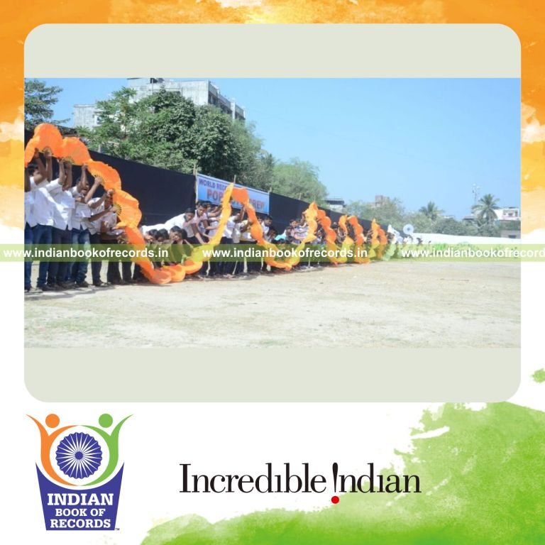 participants performing moving hand wave simultaneously for Indian Book of Records