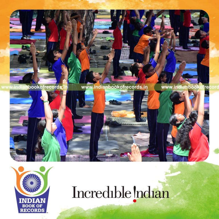 Team showcasing different yoga styles performed together simultaneously at one location recognized by Indian Book of Records