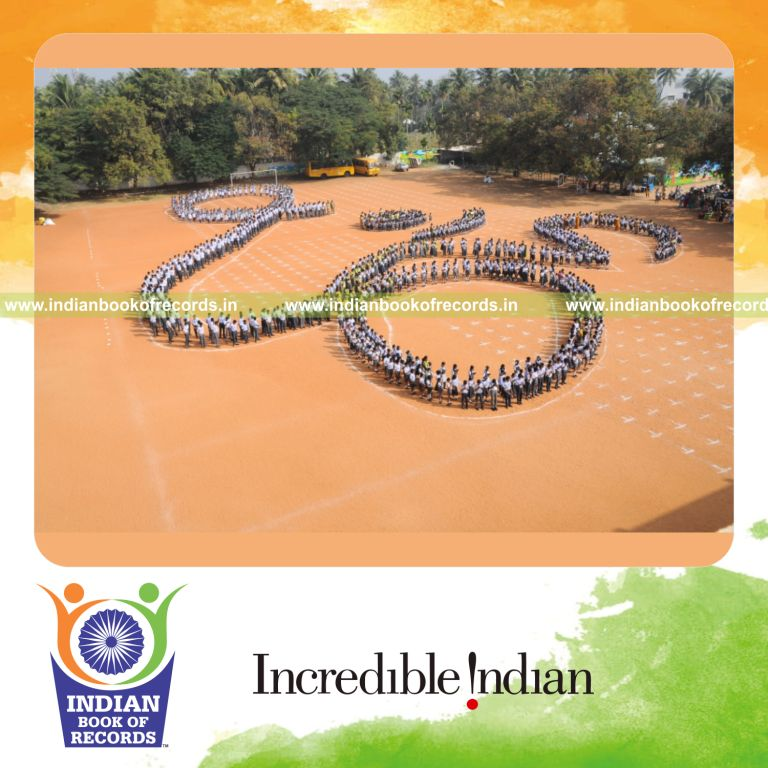 people forming om symbol human image for Indian Book of Records