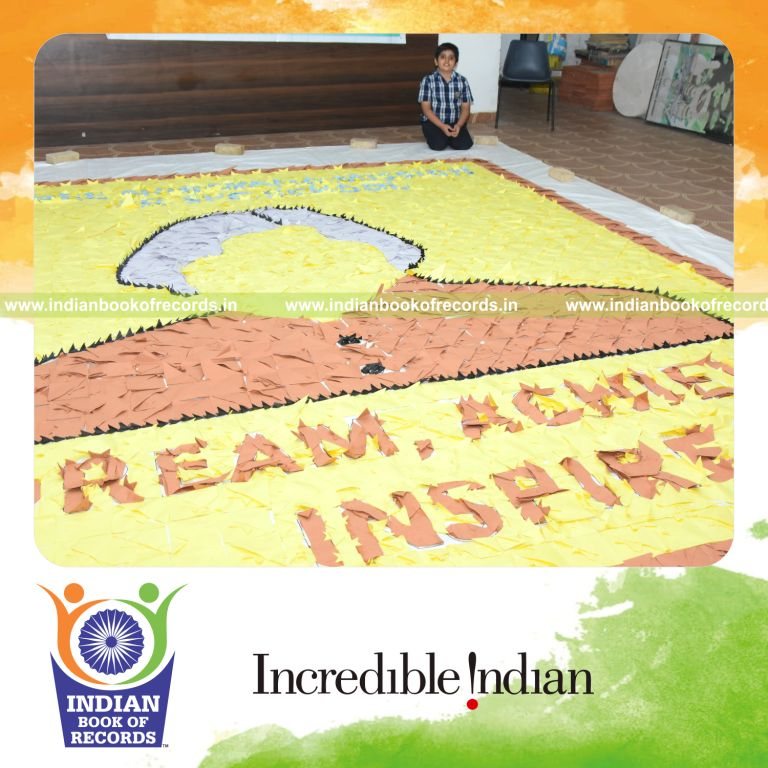 Artistic mosaic composed of many origami fish pieces arranged into a large display for Indian Book of Records