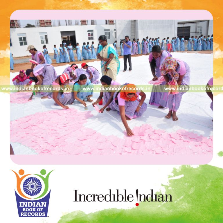team creating large origami heart mosaic for Indian Book of Records