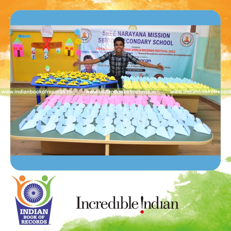 A young participant creating numerous origami hearts within two hours for the Indian Book of Records