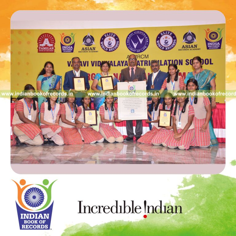 A large national flag crafted using origami hearts by a team for the Indian Book of Records