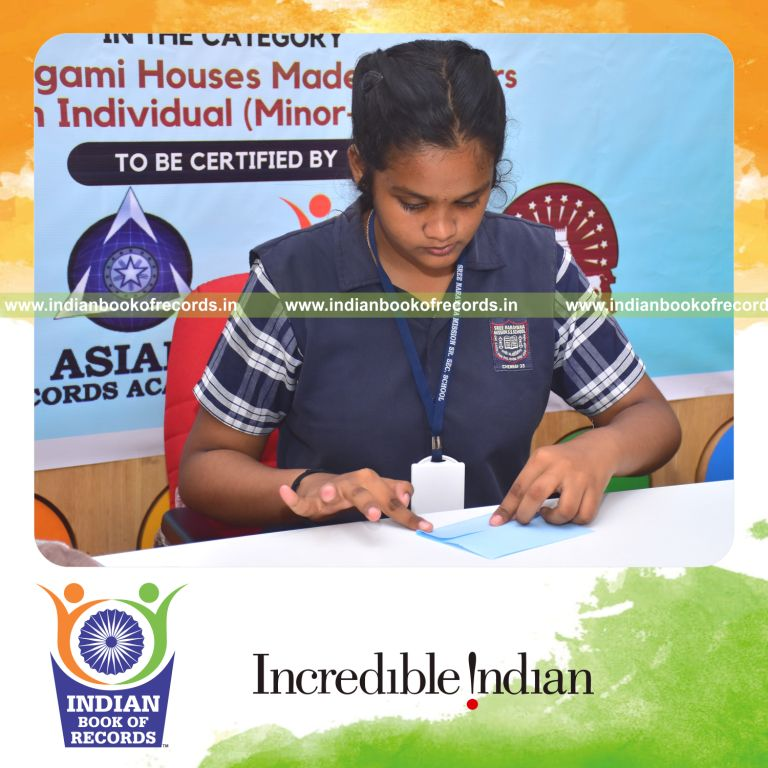 A minor participant crafting multiple origami houses within three hours for the Indian Book of Records
