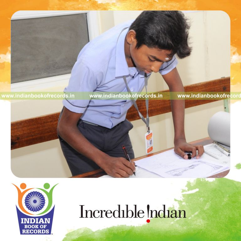 minor male creating longest pen and ink drawing for Indian Book of Records