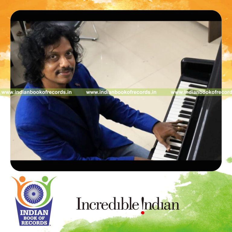 Pianist performing continuously during an extended concert session recognized by Indian Book of Records