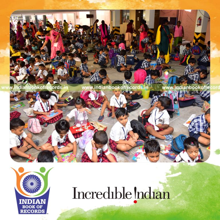 Large number of participants solving picture puzzles simultaneously at a single venue for the Indian Book of Records