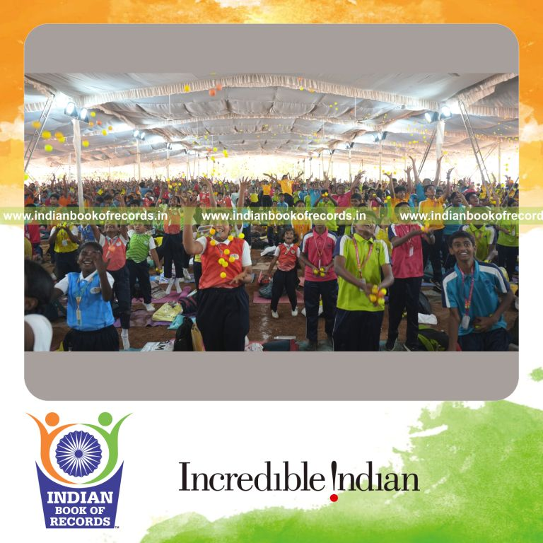 Participants playing catch with plastic balls together at one venue for Indian Book of Records