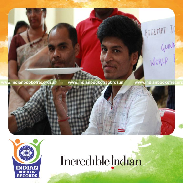 longest time spinning a plate on finger for Indian Book of Records