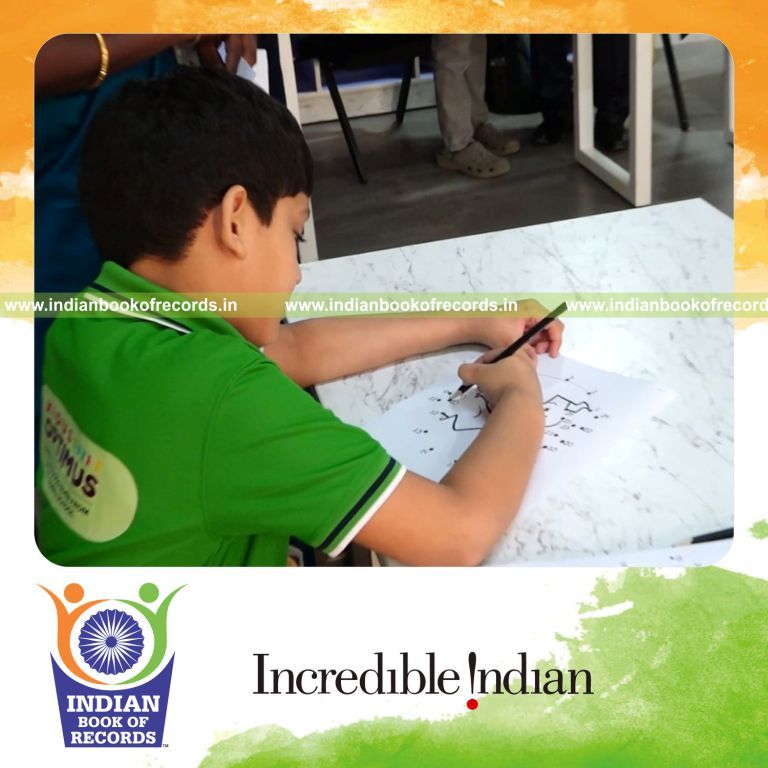 Preschool child finishing multiple dot to dot drawings quickly in a timed challenge recognized by Indian Book of Records