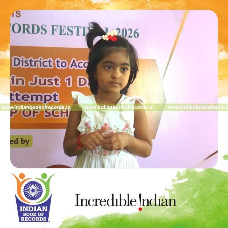 Young child quickly recalling and reciting early learning facts during a timed challenge recognized by Indian Book of Records